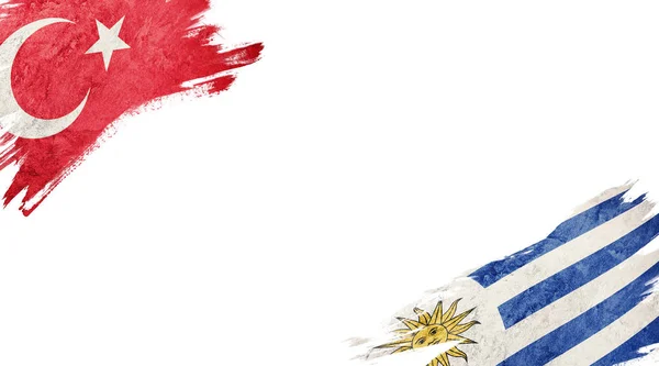 Turkiets och Uruguays flaggor på vit bakgrund — Stockfoto